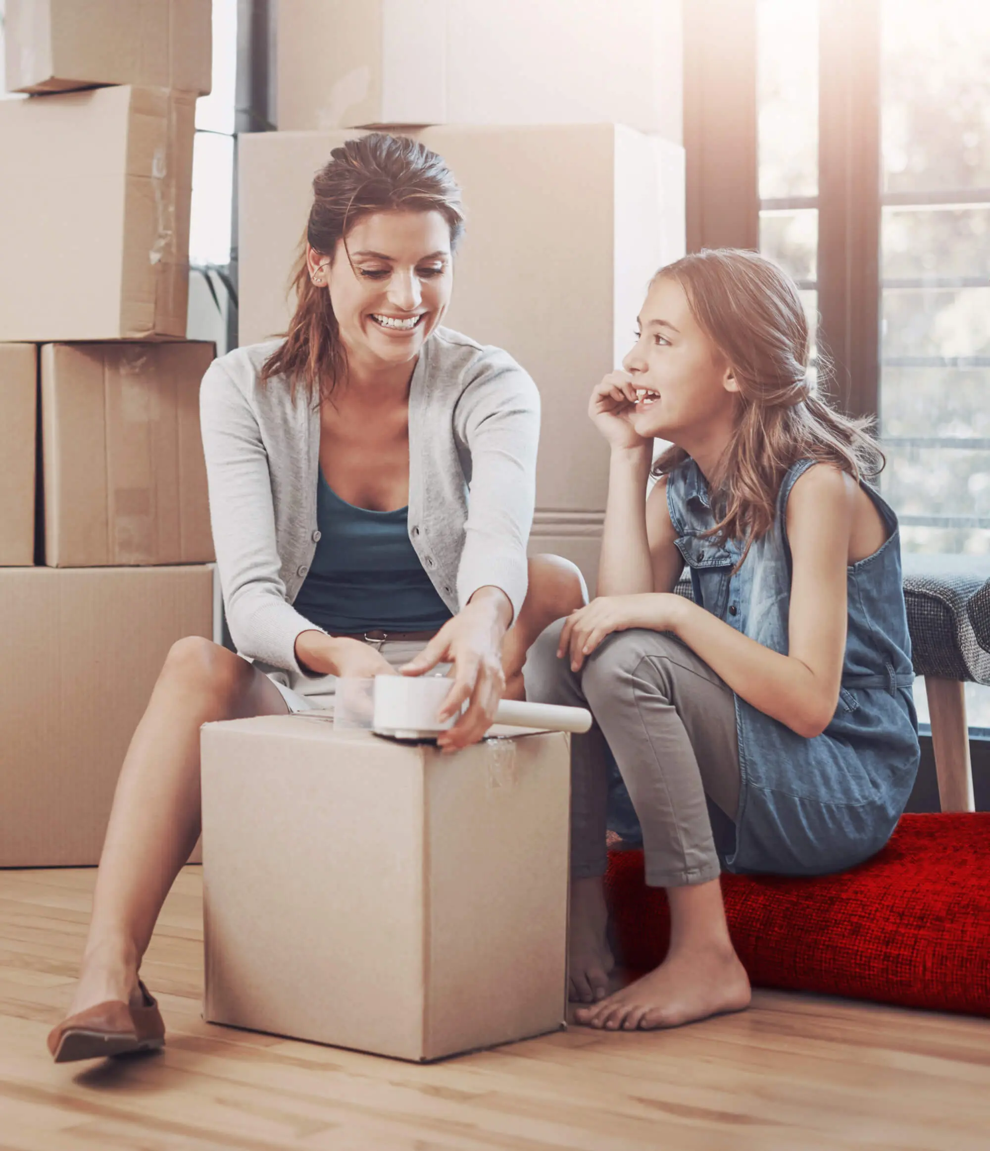 mother-child-packing-boxes-new-home-moving-mortgage-investment-property-relocation-with-bonding-woman-daughter-happy-with-tape-cardboard-package-real-estate-apartment
