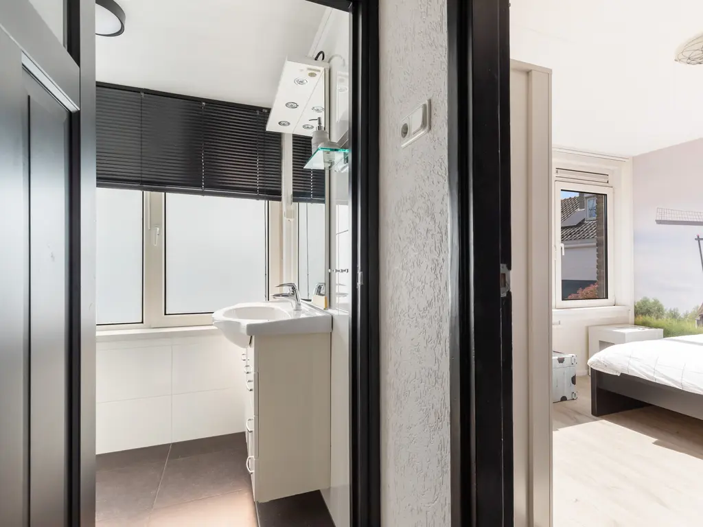 Warmoeziershof 31, HENDRIK-IDO-AMBACHT