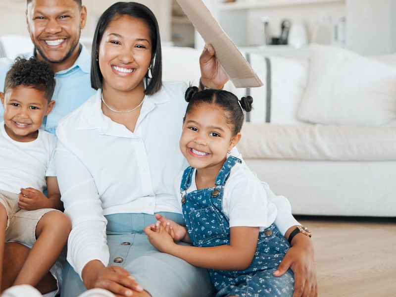 portrait-of-a-young-family-sitting-on-the-lounge-f-2023-11-27-05-33-48-utc.jpg