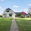 B&B te koop: Grote woonboerderij met vier B&B-appartementen