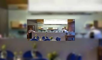 Okura viert Bib voor Serre Restaurant