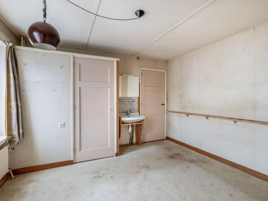 Waalstraat 19, RHOON