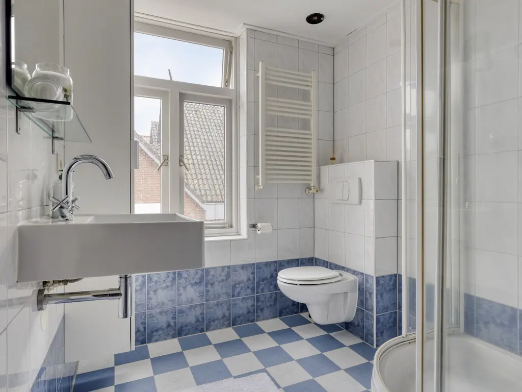 Minneputtestraat 1, THOLEN