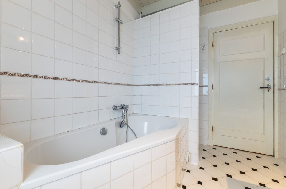 Tussenwoning te koop: Leliestraat 7, Woerden