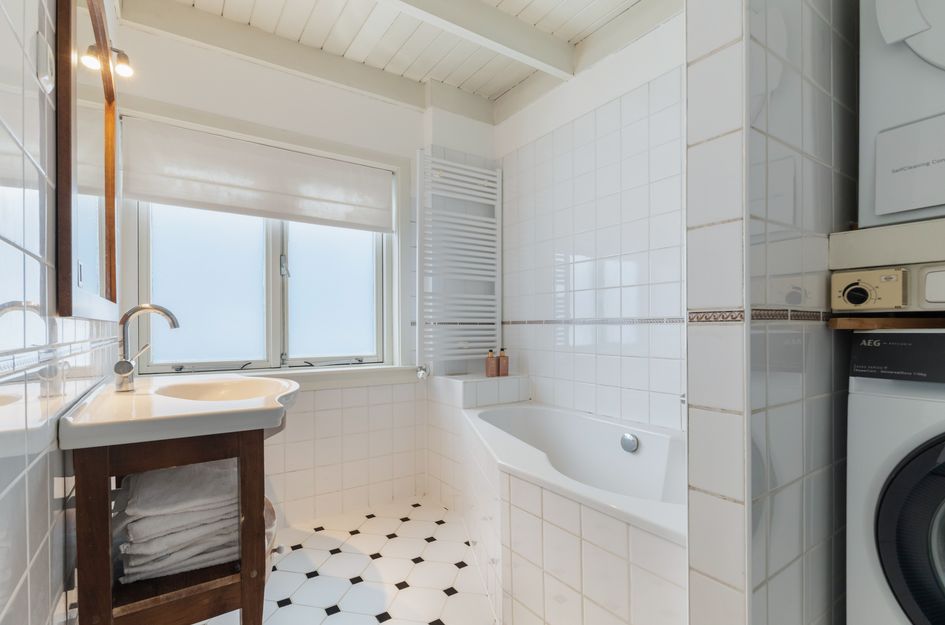 Tussenwoning te koop: Leliestraat 7, Woerden