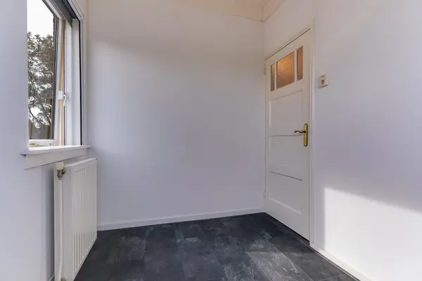 Limmerschouw 25, WINKEL