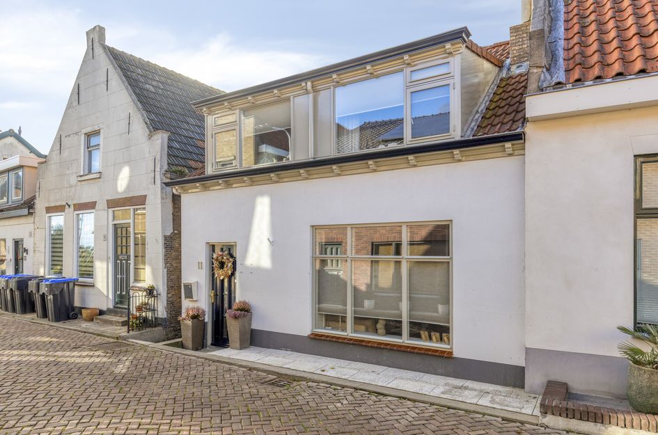 Hoekwoning te koop: Slikdijk 11, Ooltgensplaat