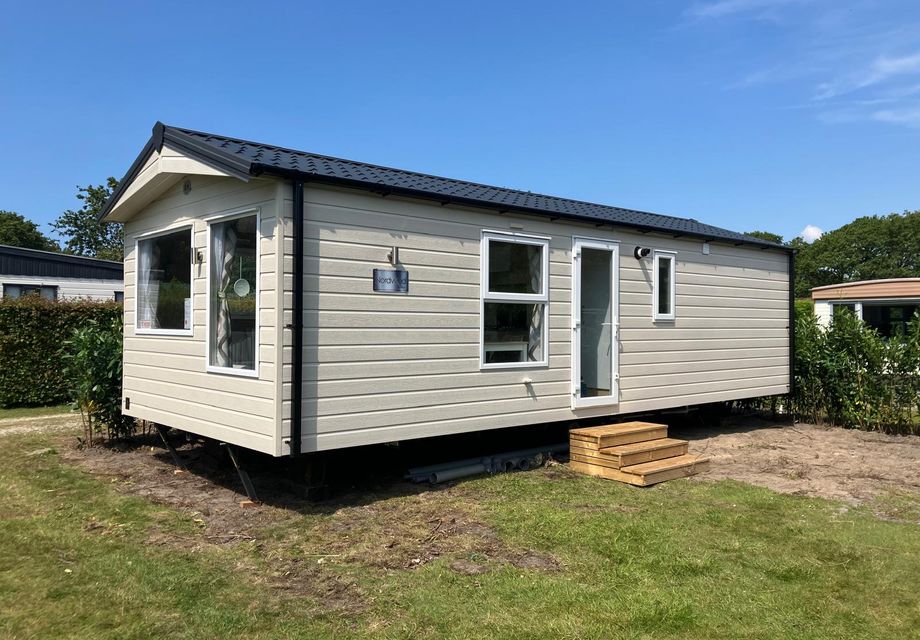 Kavel + nieuw chalet op camping Witte in Ouddorp