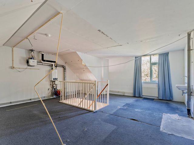 Muntslag 55, Houten