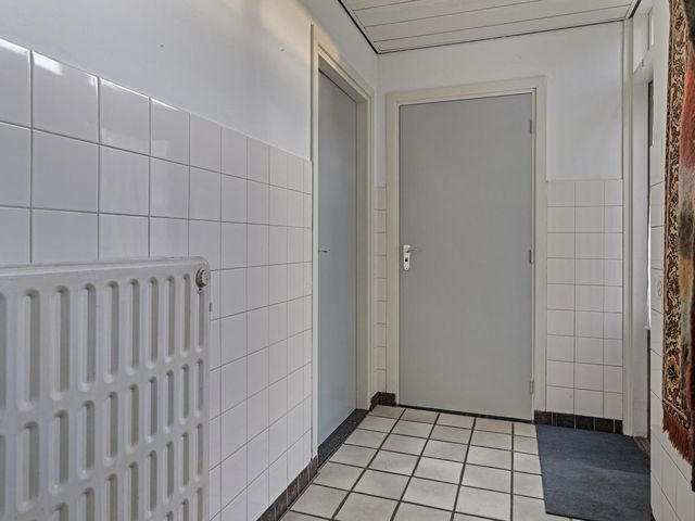 Burgemeester van Erpstraat 32, Berghem