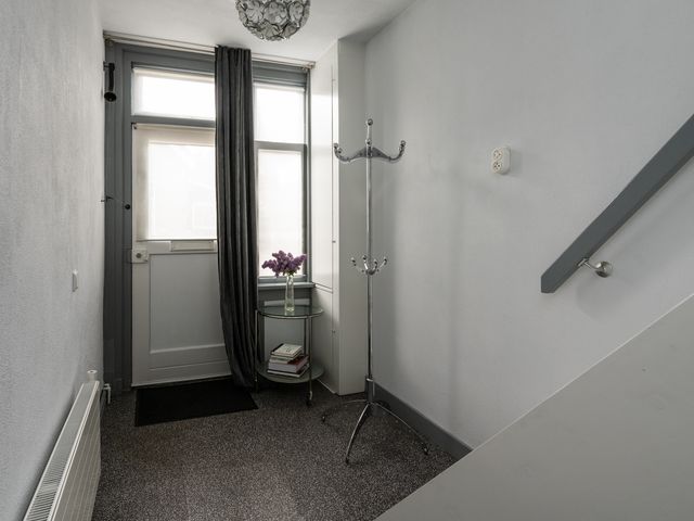 Spui 64, Strijen