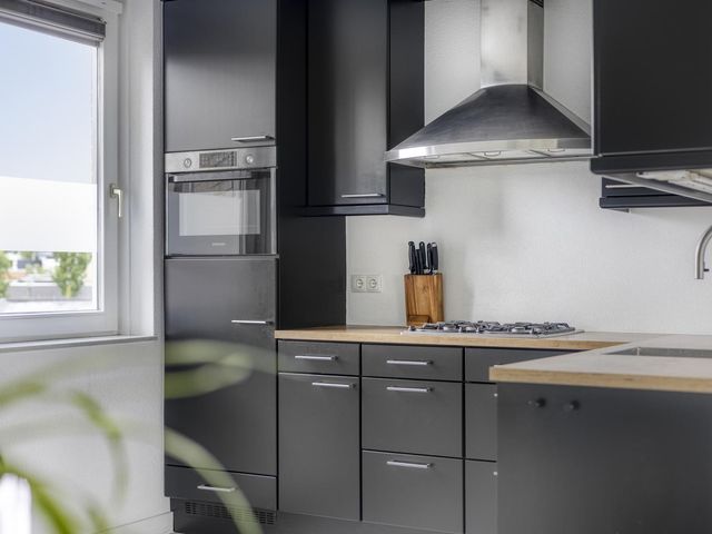 Muntmeester 77, Uden