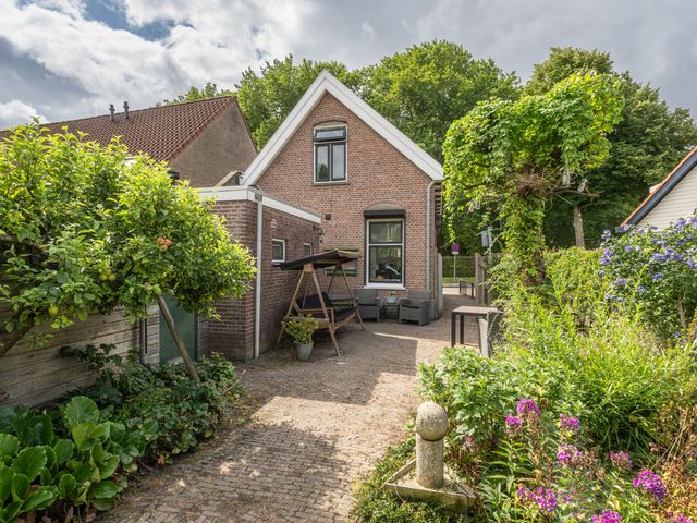 Kerksingel 32, Ooltgensplaat