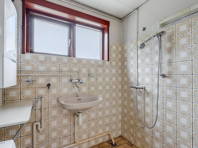 Schenkeldijk 15, Strijen