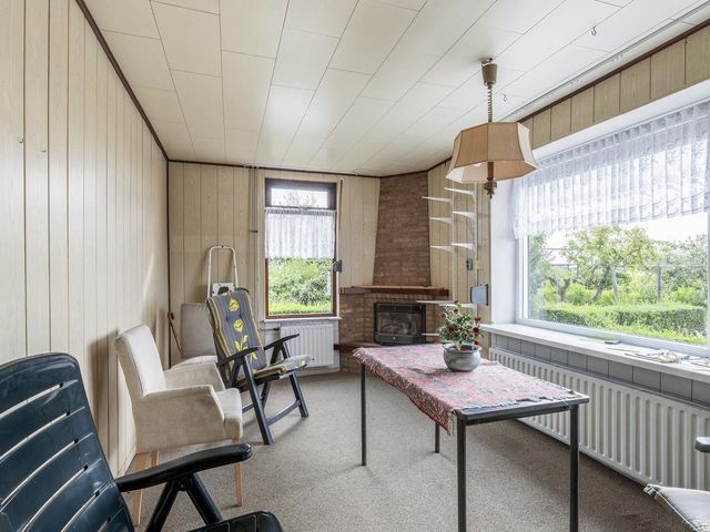 Weelweg 1, Sint-Maartensdijk