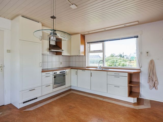 De Holm 15I, Tolbert