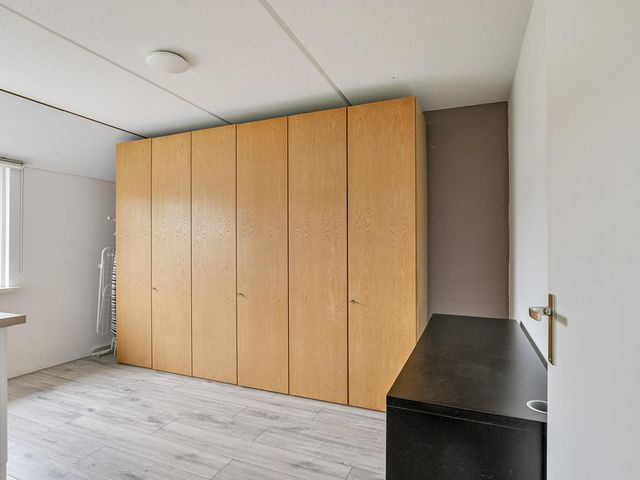 Dullert 69, Huissen