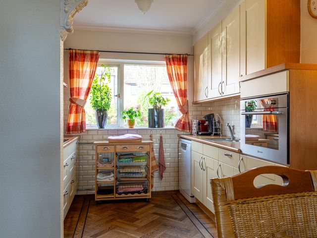 Kamille 23, Sprang-Capelle