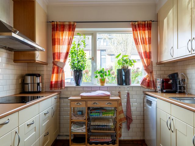 Kamille 23, Sprang-Capelle