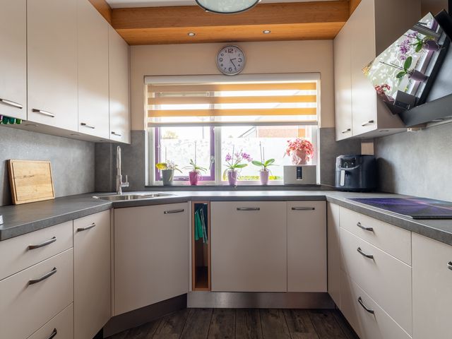 Kamille 15, Sprang-Capelle