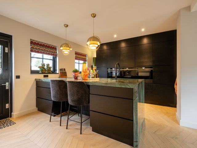 Schoutlaan 1, Asperen