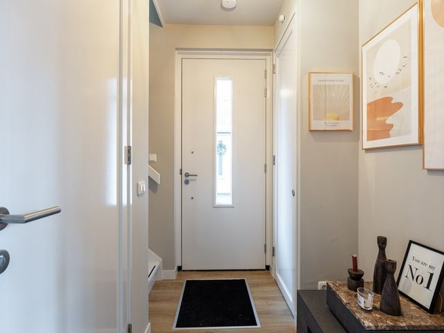 Tiengastraat 8, Opende