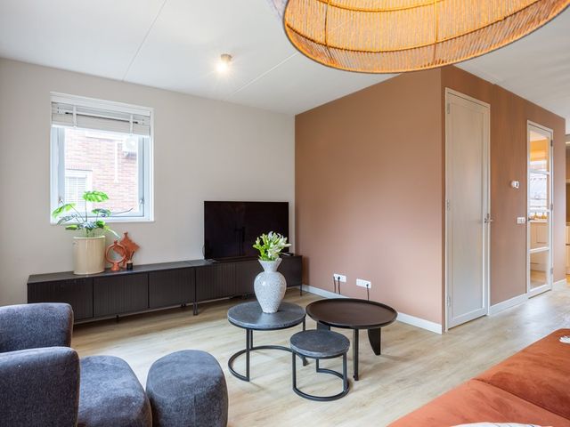 Tiengastraat 8, Opende