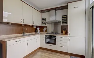 Warmoeziershof 4, HENDRIK-IDO-AMBACHT