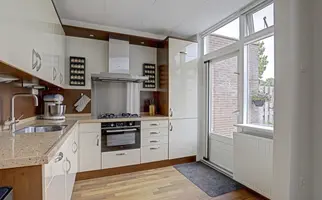 Warmoeziershof 4, HENDRIK-IDO-AMBACHT