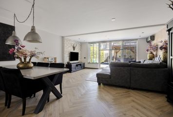 Aert Schoumanstraat 13, HENDRIK-IDO-AMBACHT